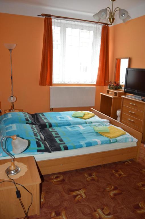 Postel nebo postele na pokoji v ubytování Hotel Paradise