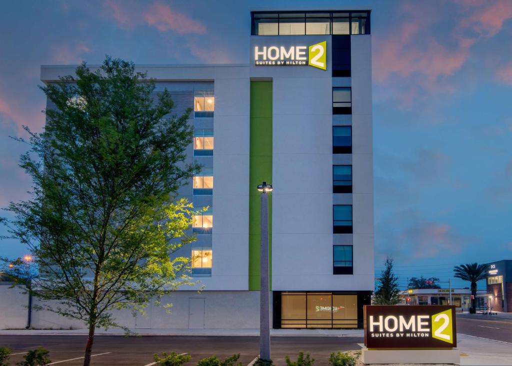 a building with a home mortgage sign in front of it at Home2 Suites By Hilton Jacksonville Downtown in Jacksonville