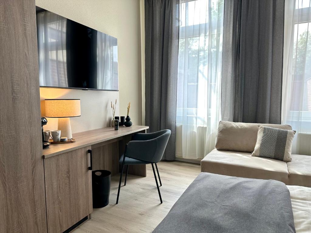 TV/Unterhaltungsangebot in der Unterkunft City Hotel Hameln