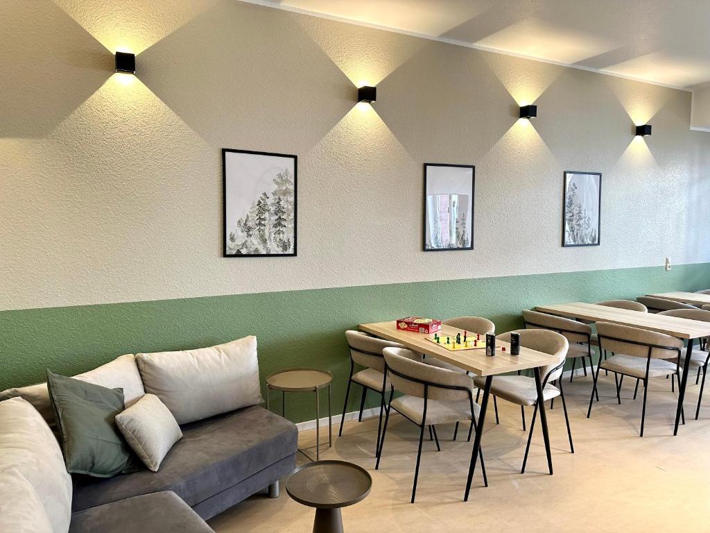 Ein Sitzbereich in der Unterkunft City Hotel Hameln