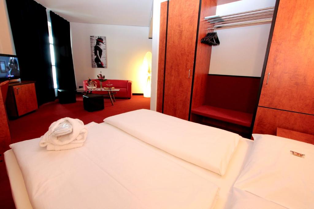 Postel nebo postele na pokoji v ubytování Ara Hotel Comfort