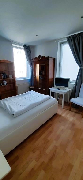 Postel nebo postele na pokoji v ubytování Hotel Rhein-Residenz
