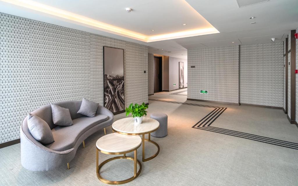Posezení v ubytování Shenzhen Longgang Central City Jinjiang Metropolo Hotel