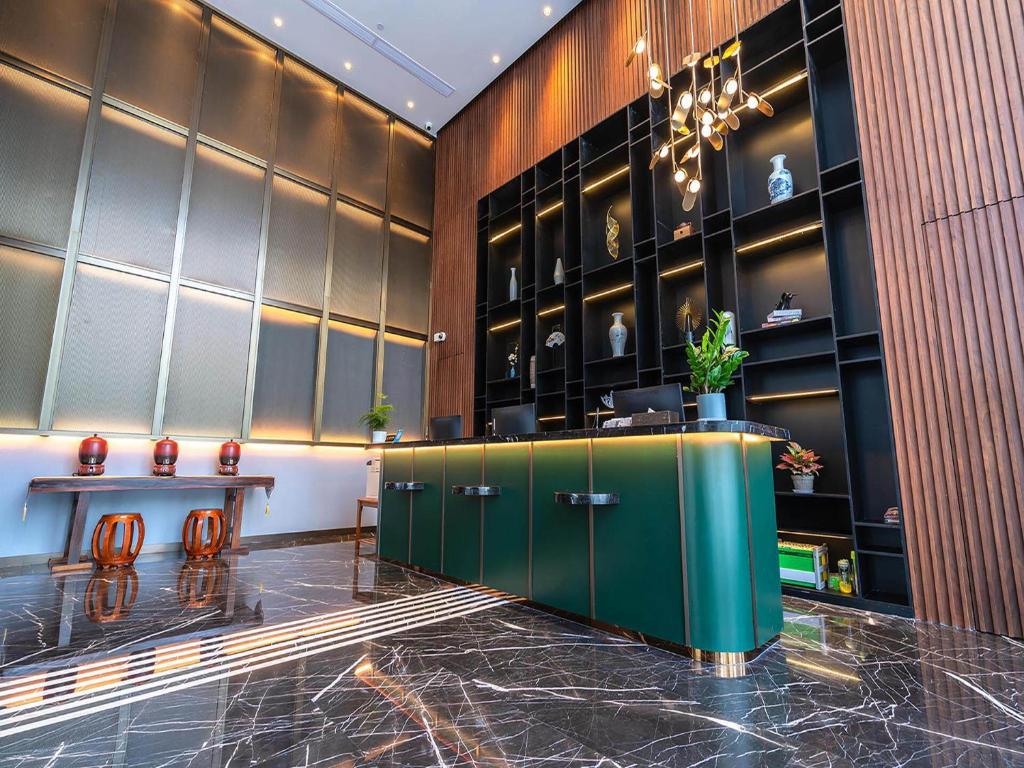 Lounge nebo bar v ubytování Shenzhen Longgang Central City Jinjiang Metropolo Hotel