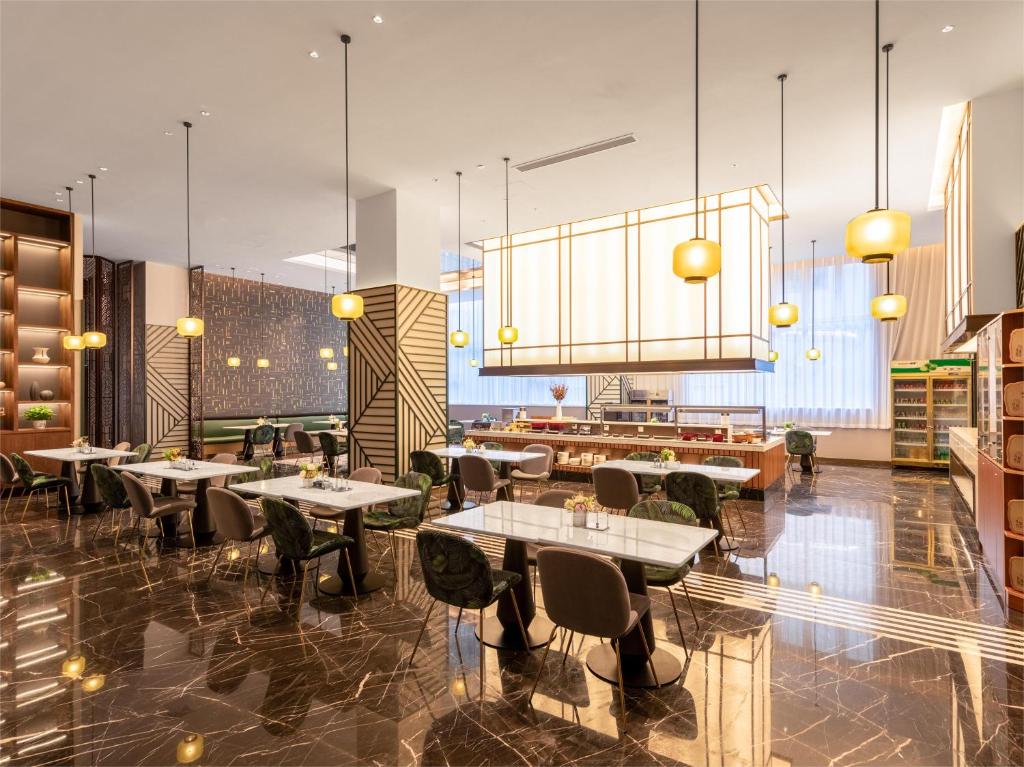 Restaurace v ubytování Shenzhen Longgang Central City Jinjiang Metropolo Hotel