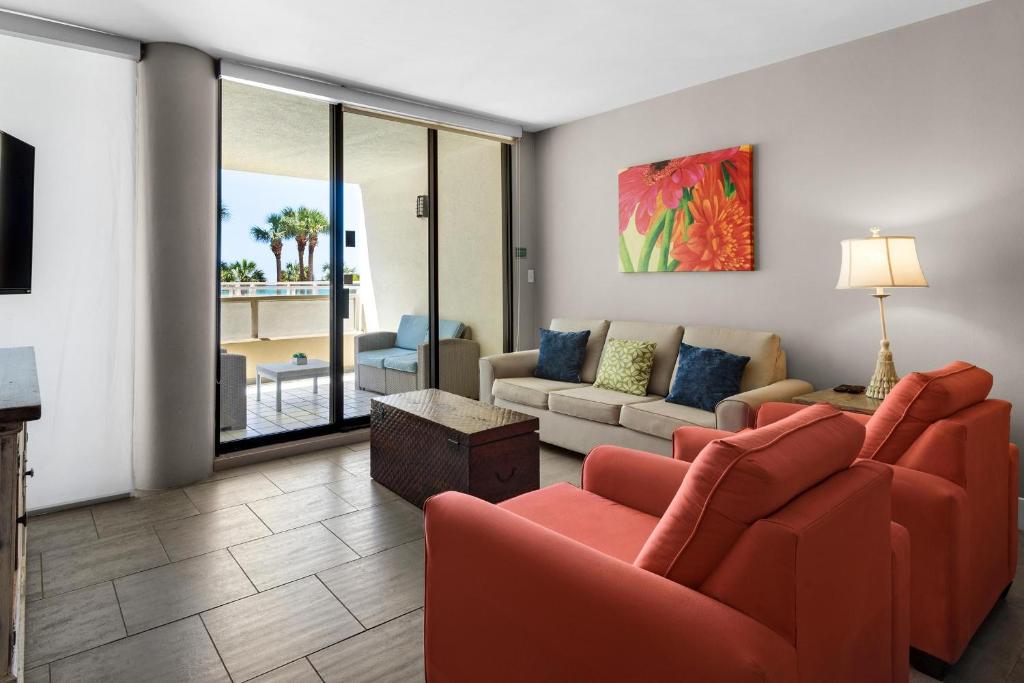 a living room with two couches and a couch at East Pass 101 in Destin