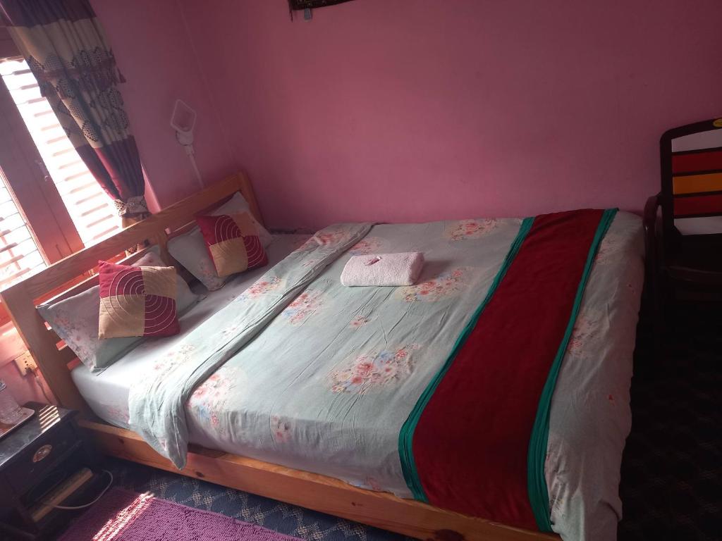 Letto o letti in una camera di Galaxy Inn Guest House