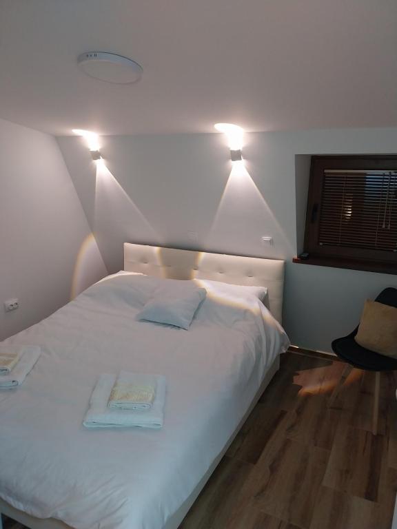 Ένα ή περισσότερα κρεβάτια σε δωμάτιο στο Tulevi apartments