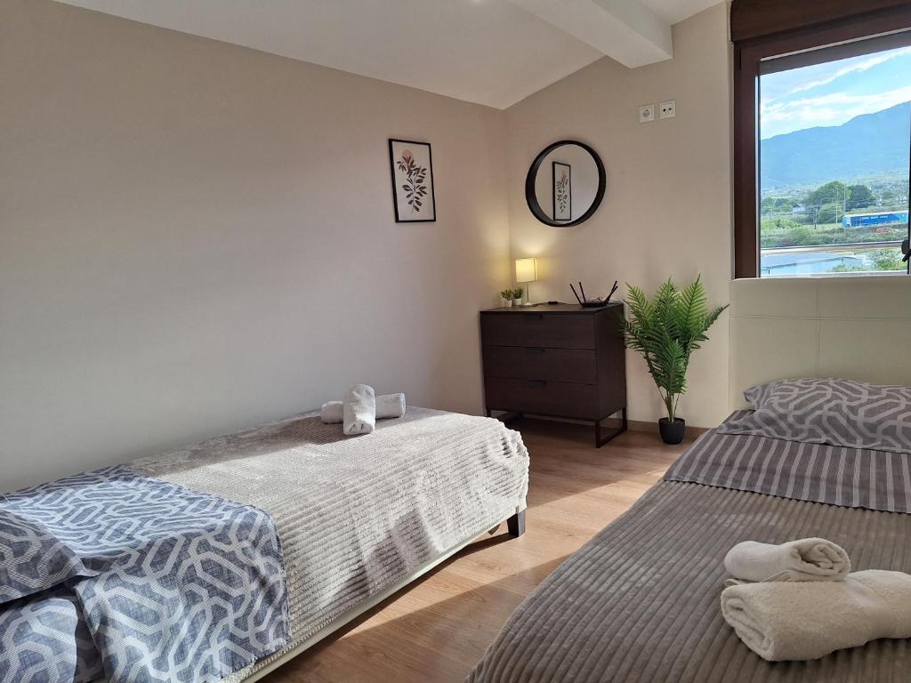 Postel nebo postele na pokoji v ubytování Luxury suite with sea and Olympus view
