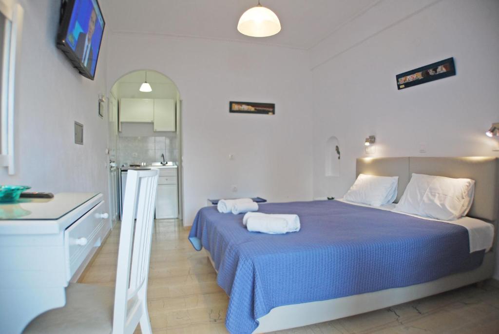 Letto o letti in una camera di Aretousa Villas
