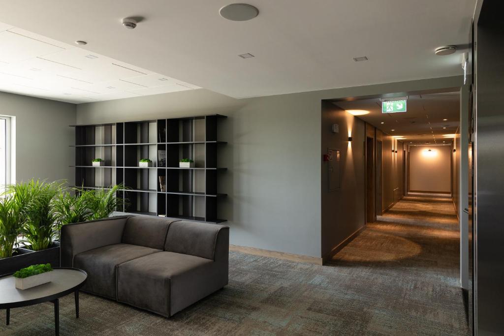 Posezení v ubytování Molėtai Hotel