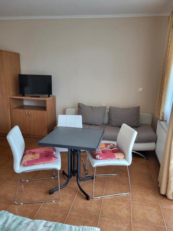 Televízia a/alebo spoločenská miestnosť v ubytovaní Tip-Top Apartmenthouse
