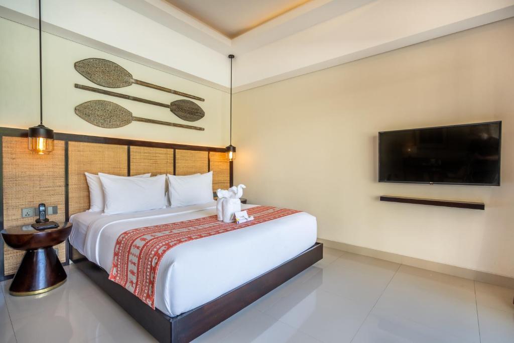 Postel nebo postele na pokoji v ubytování Sanctoo Suites & Villas
