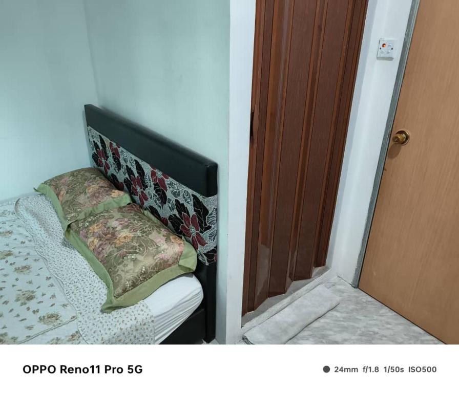 Postel nebo postele na pokoji v ubytování NaVita Lodge