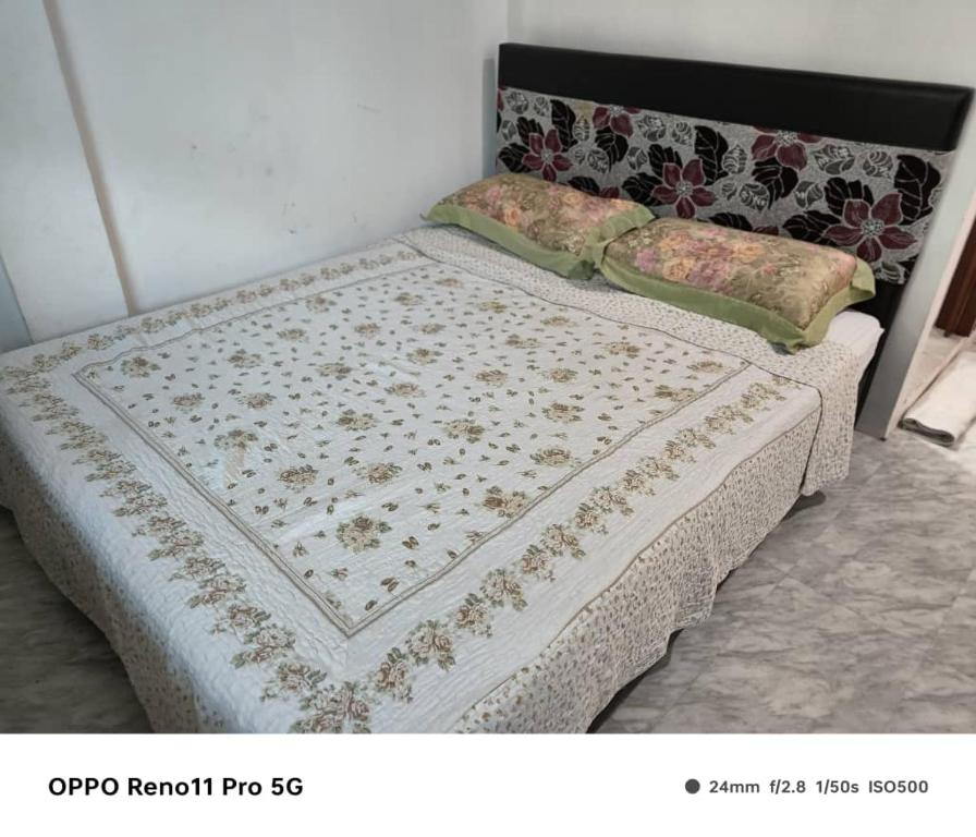 Postel nebo postele na pokoji v ubytování NaVita Lodge