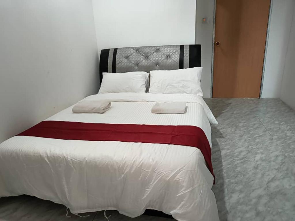 Postel nebo postele na pokoji v ubytování NaVita Lodge