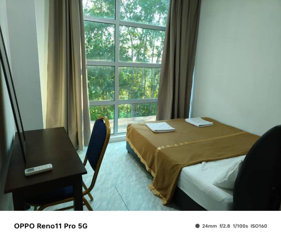 Postel nebo postele na pokoji v ubytování NaVita Lodge