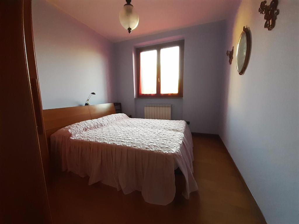 Postel nebo postele na pokoji v ubytování I Tre Aceri