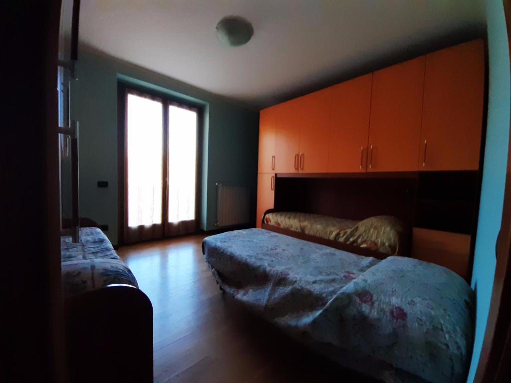 Postel nebo postele na pokoji v ubytování I Tre Aceri