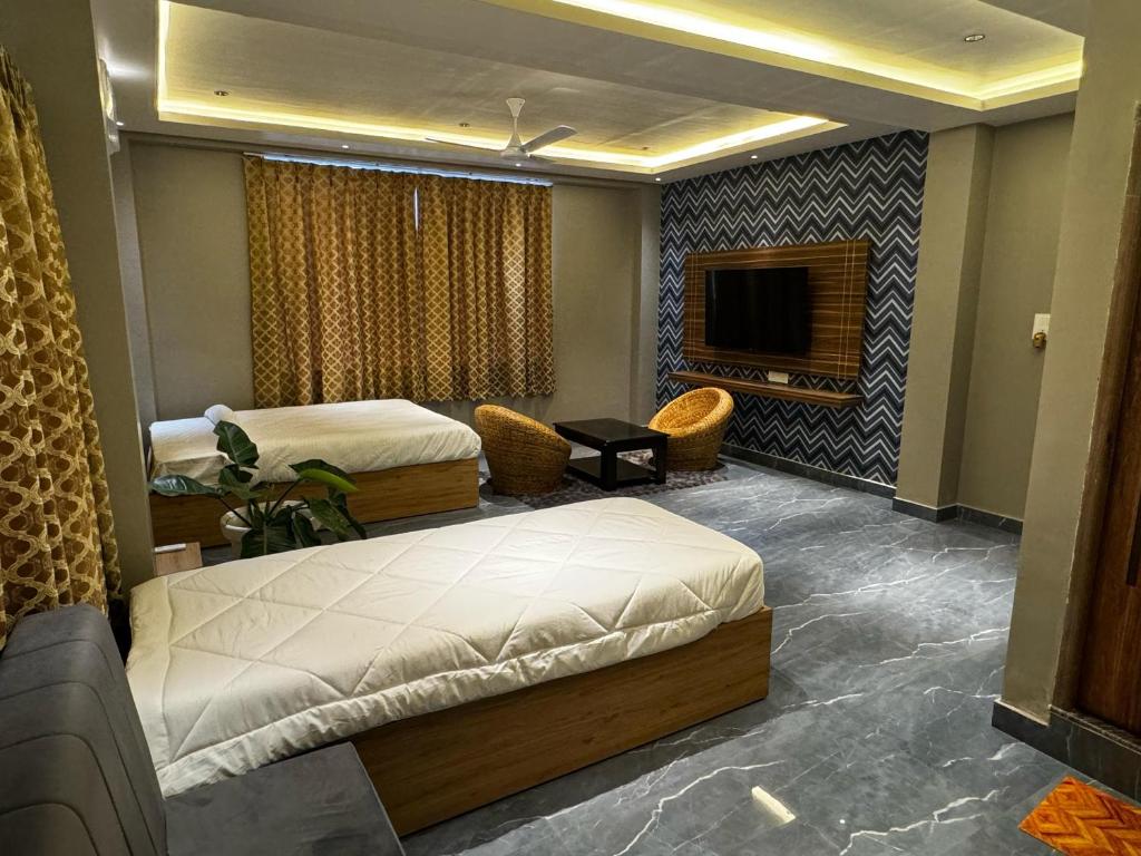 Hotel Canal View tesisinde bir odada yatak veya yataklar
