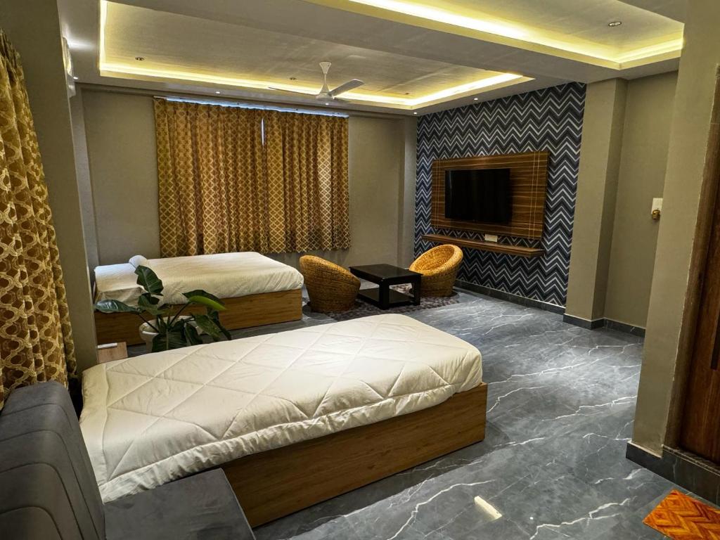 TV a/nebo společenská místnost v ubytování Hotel Canal View