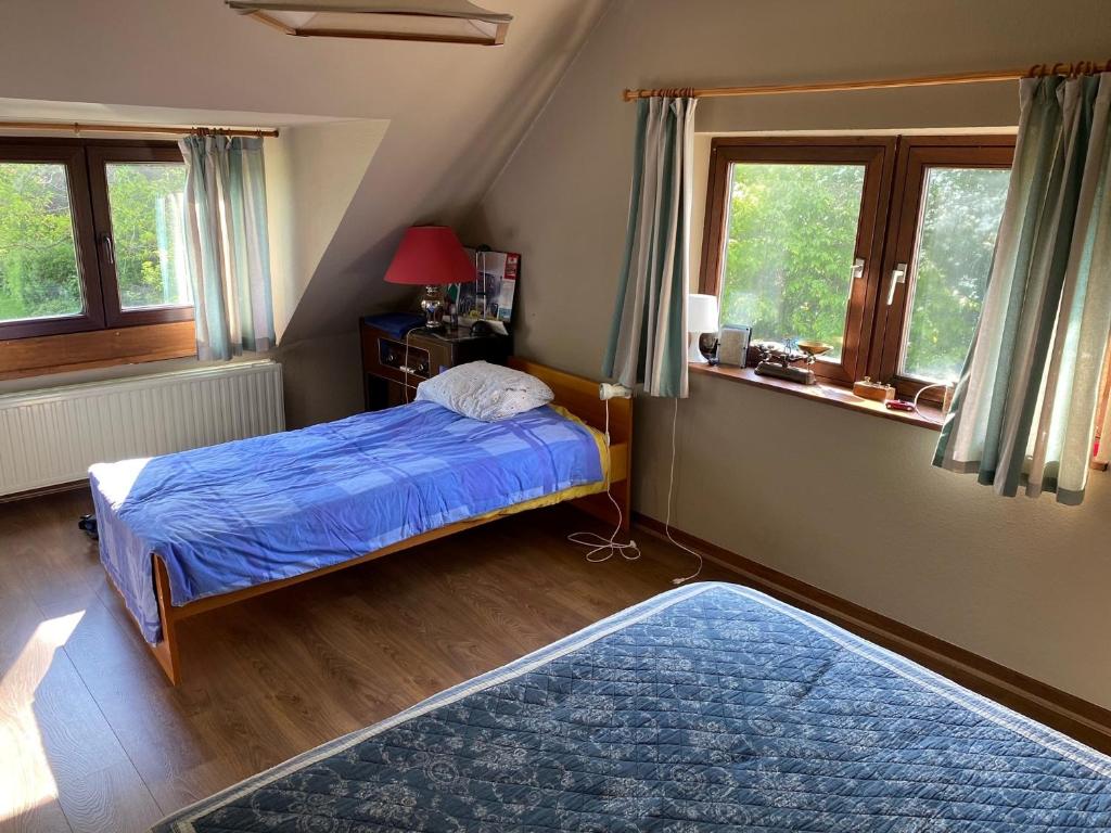Postel nebo postele na pokoji v ubytování Romy