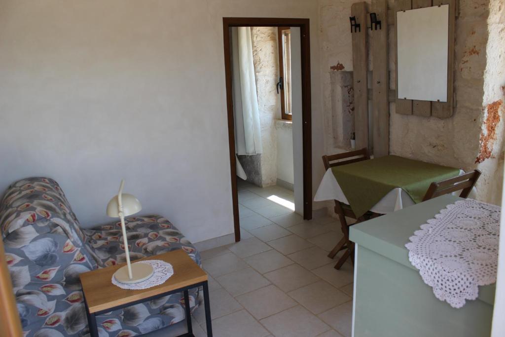 Posezení v ubytování Il Trullo e la Pietra