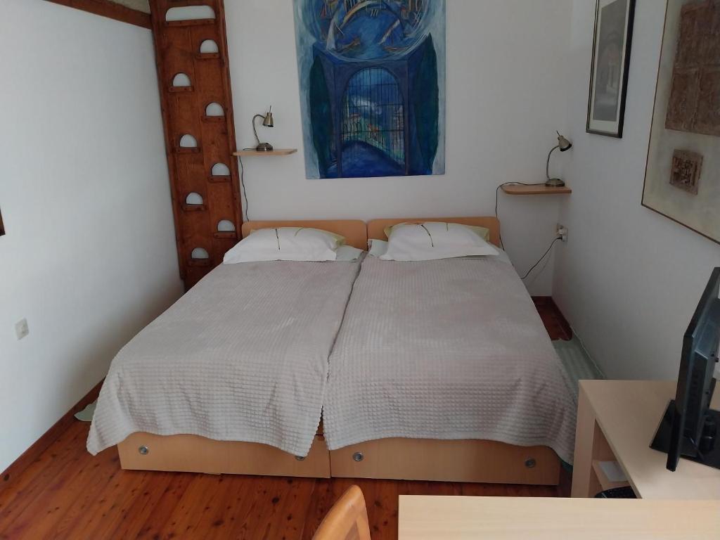 Postel nebo postele na pokoji v ubytování App Antonija
