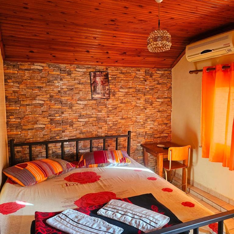 Postel nebo postele na pokoji v ubytování Dafina Hotel