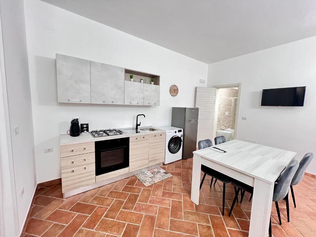 Kuchyň nebo kuchyňský kout v ubytování AMBRA’S HOME
