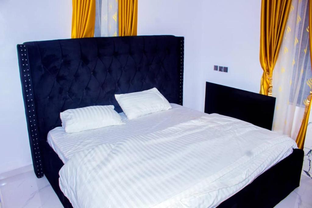 Postel nebo postele na pokoji v ubytování A and T apartment