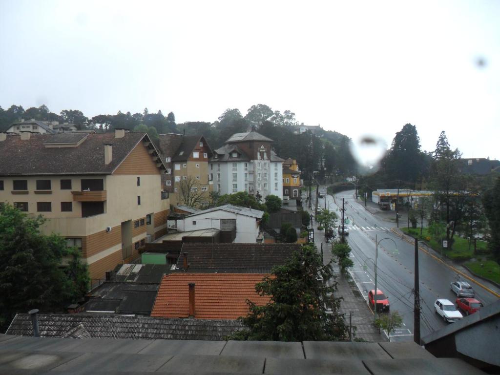 a view of a city with a street and buildings at Suite No Centro De Gramado in Gramado