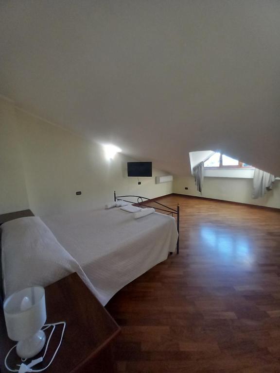 Televízia a/alebo spoločenská miestnosť v ubytovaní Qvattro stagioni panoramic suites