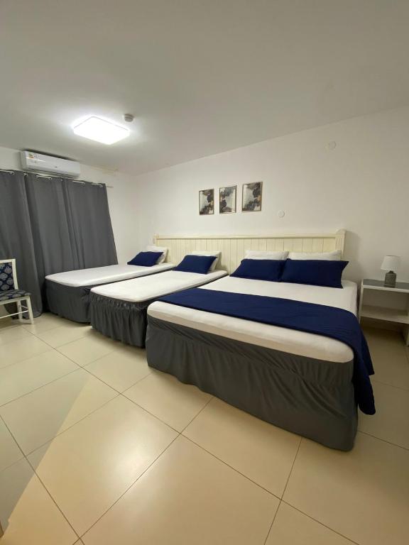 Postel nebo postele na pokoji v ubytování Hotel Renty Beach
