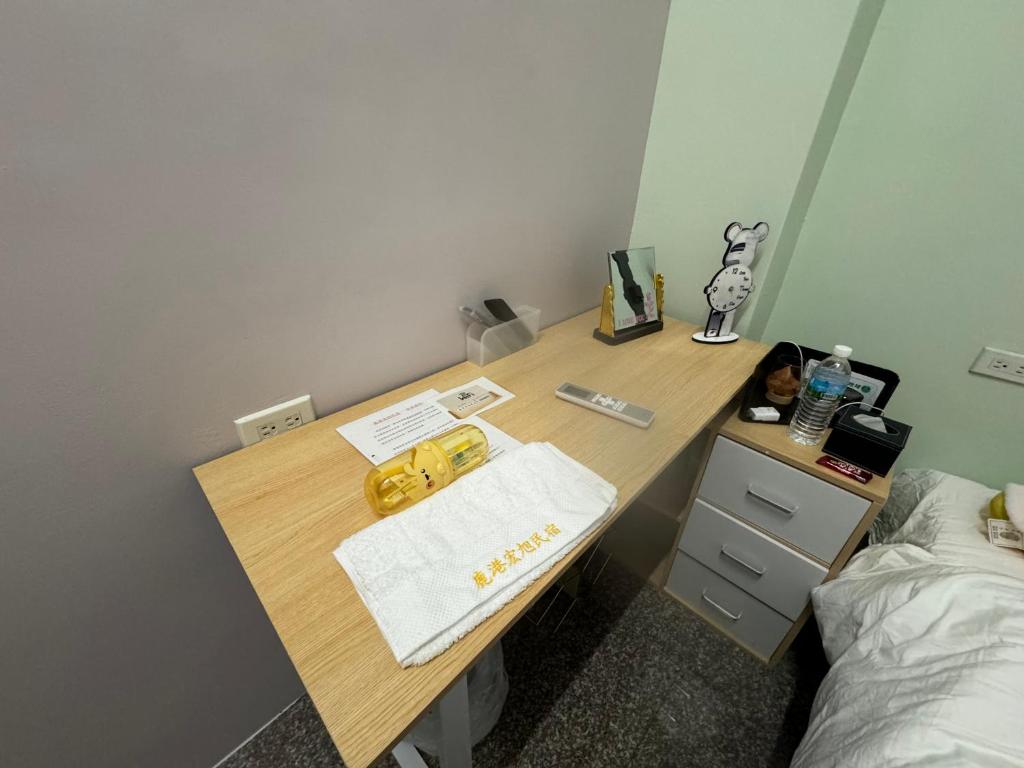 Postel nebo postele na pokoji v ubytování Lukang Hung-shiu Homestay