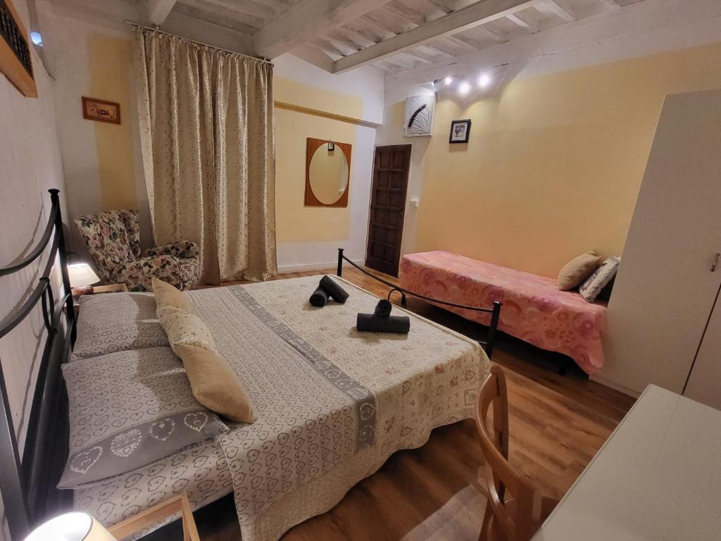 Postel nebo postele na pokoji v ubytování B&B Casa Fei