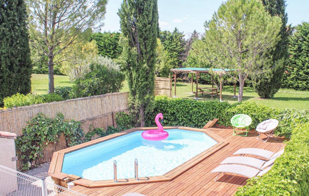 Bazén v ubytování Les Romarins dans le Mas de la PERRINE entre AVIGNON LUBERON Mt VENTOUX nebo v jeho okolí