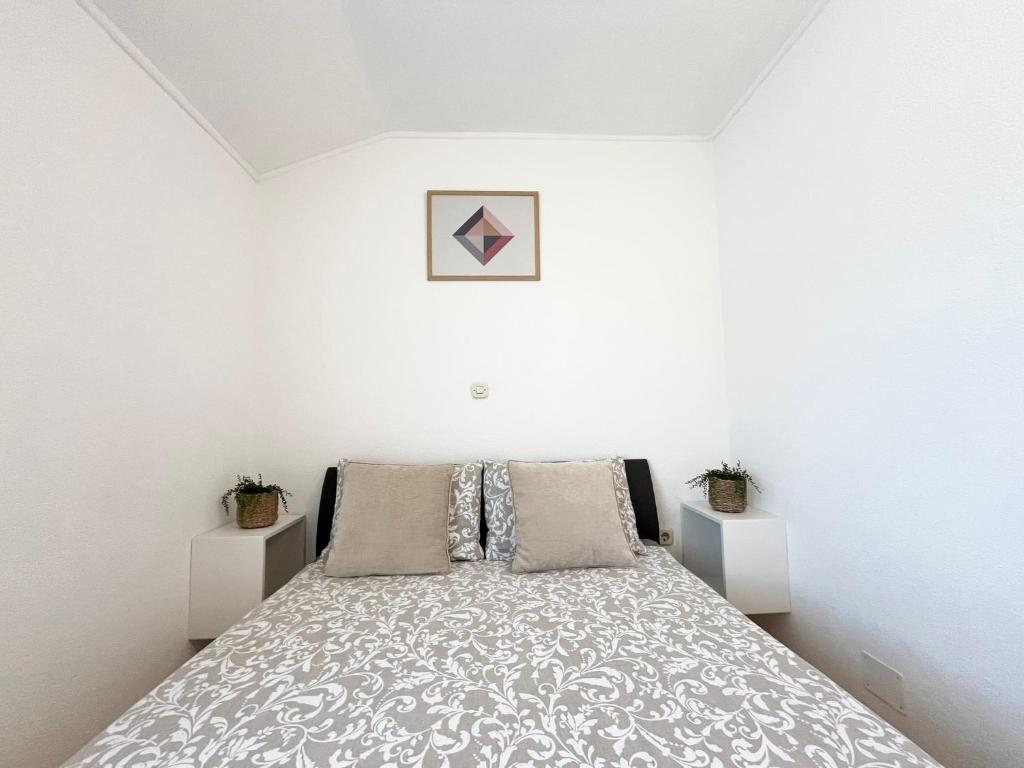 Postel nebo postele na pokoji v ubytování Apartments Contessa