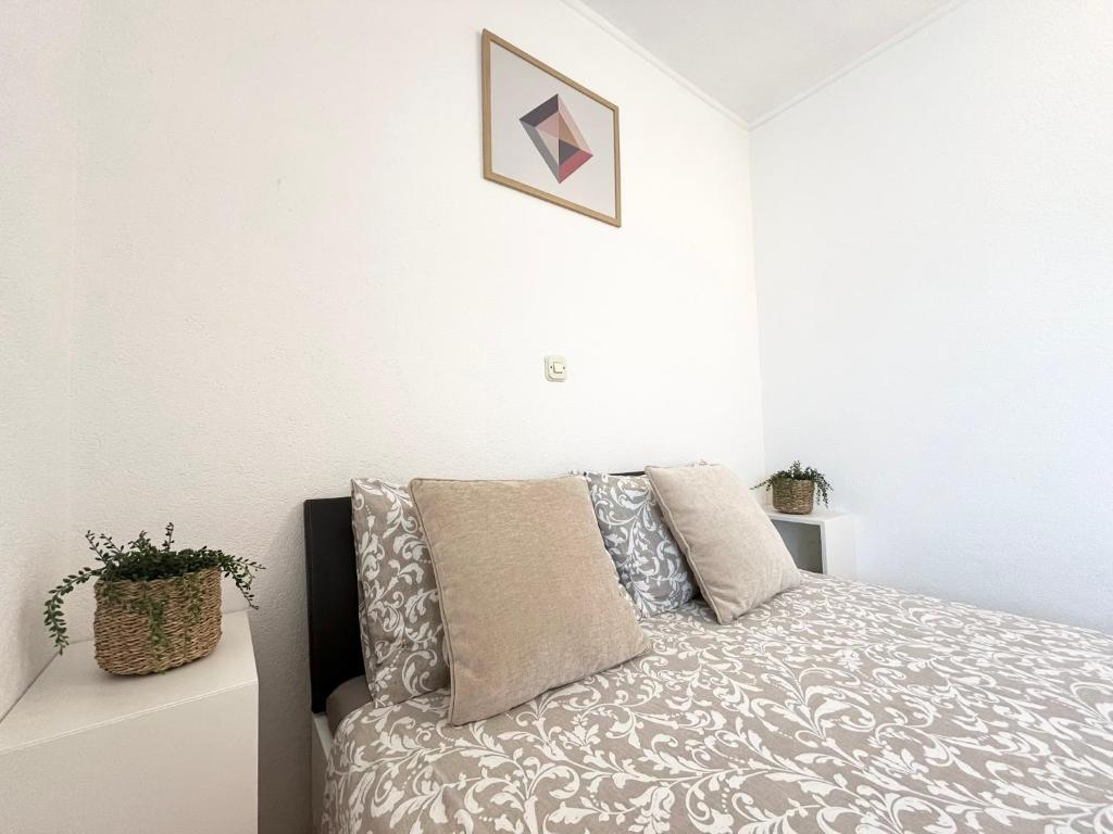 Postel nebo postele na pokoji v ubytování Apartments Contessa