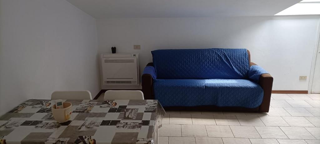 A seating area at Bibione villa Torino via della bilancia 43