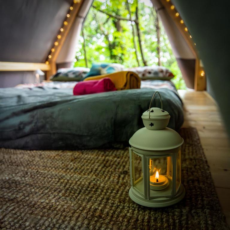 Postelja oz. postelje v sobi nastanitve Tenda Tipì Glamping Verde Mare by SMART-HOME