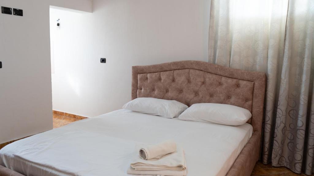 Postel nebo postele na pokoji v ubytování Villa Osmani