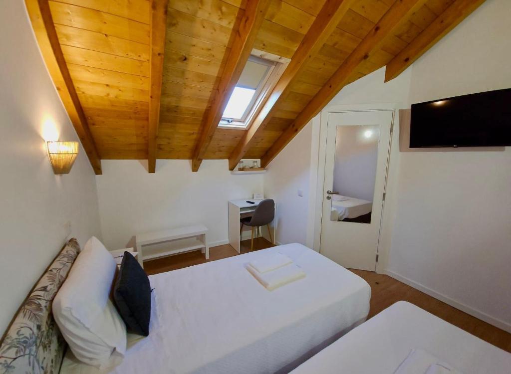 Postel nebo postele na pokoji v ubytování Casa do Chafariz - Rooms