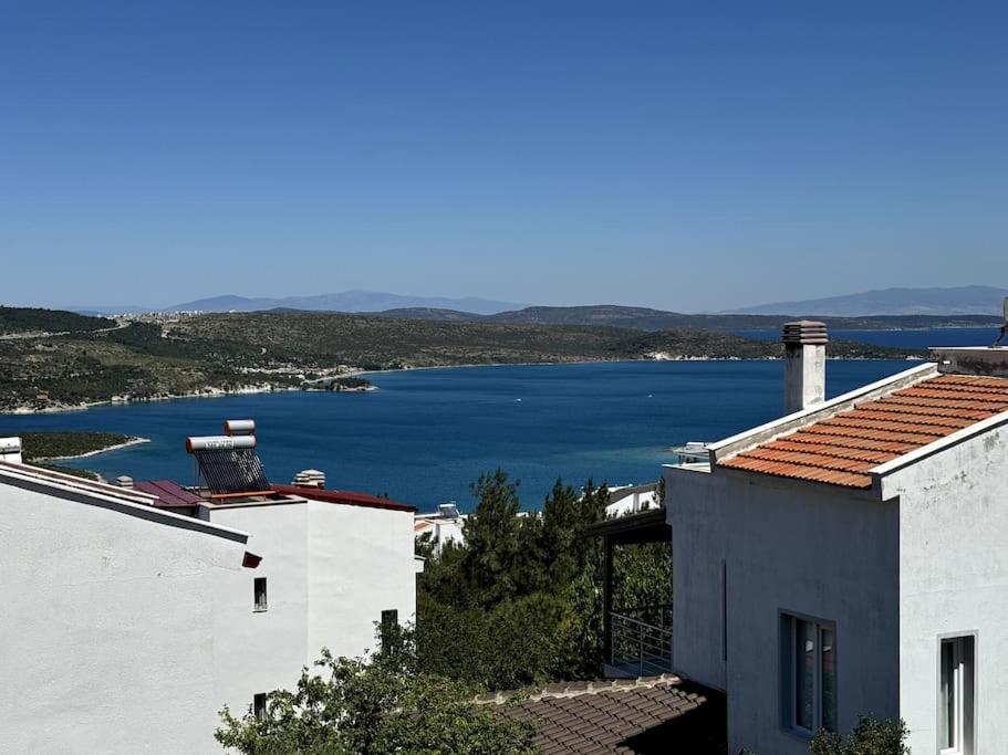 a view of a large body of water from a building at Triplex Villa with Pool in a Secure Site in Izmir
