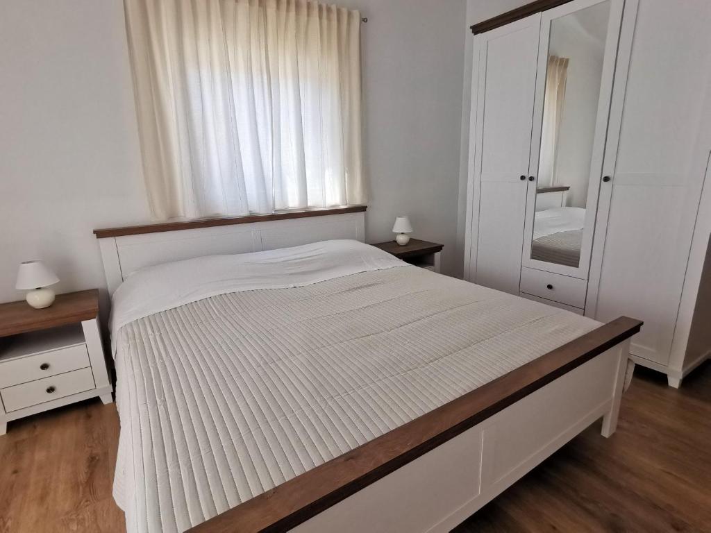 Postel nebo postele na pokoji v ubytování Apartments Monika Nin