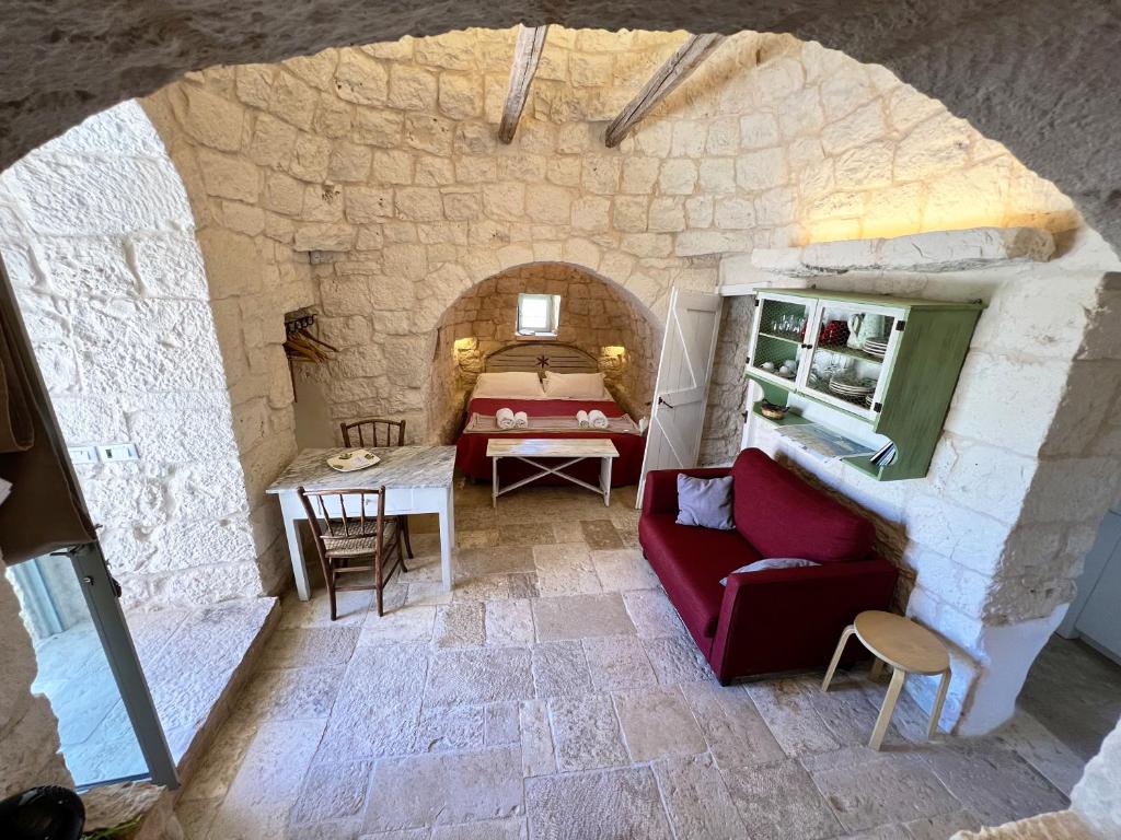 Posezení v ubytování Trullo fiore