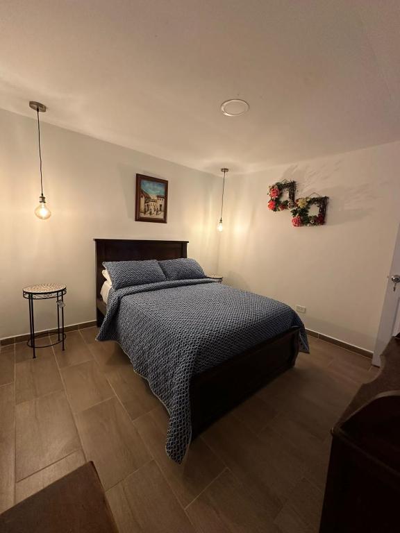 Postel nebo postele na pokoji v ubytování Casa colonial filandia