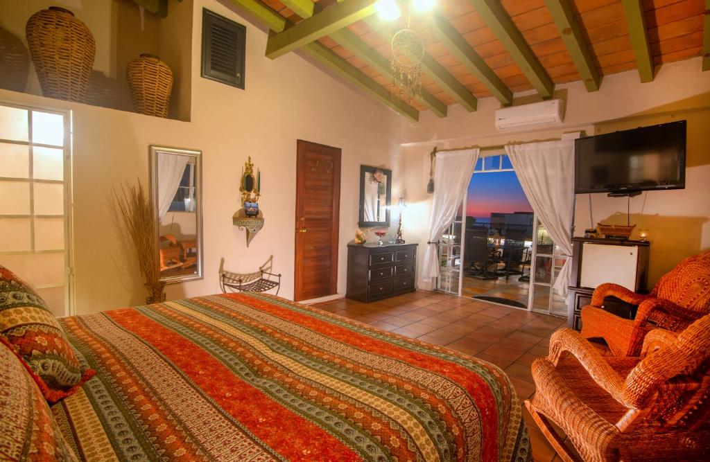 TV a/nebo společenská místnost v ubytování Casa Romance Escondido