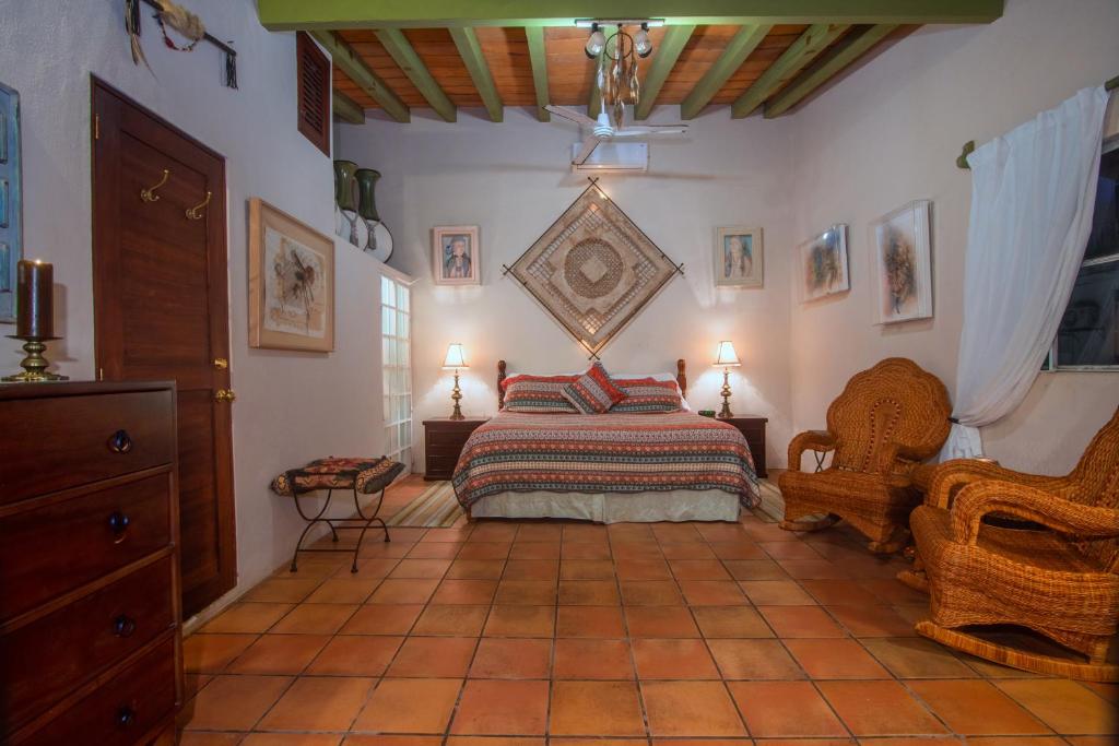 Postel nebo postele na pokoji v ubytování Casa Romance Escondido