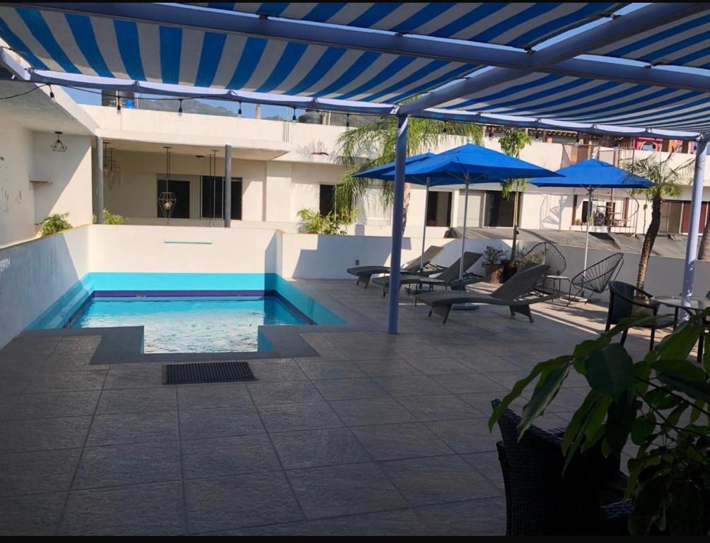 Bazén v ubytování Hotel Boutique Ixaya nebo v jeho okolí
